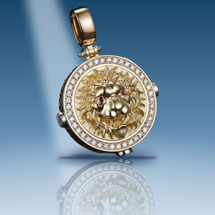 Yellow gold diamond lion head with ruby eyes pendant
