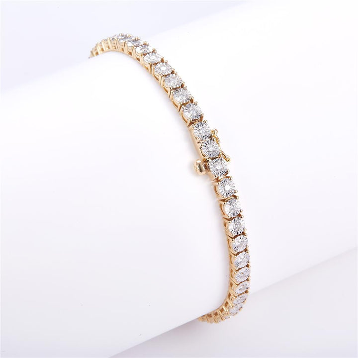 1.08 Ct. Diamond 10 Kt Gold (Yellow). Tennis with Illusion Setting Bracelet. (Unisex). 7 in Long. 3.7 mm Wide
