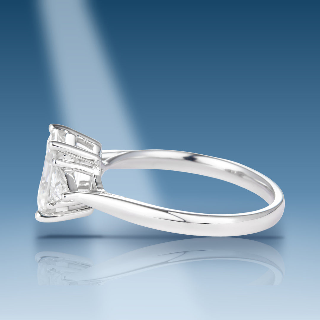 Sterling silver moissanite solitaire with emerald cut center stone ring