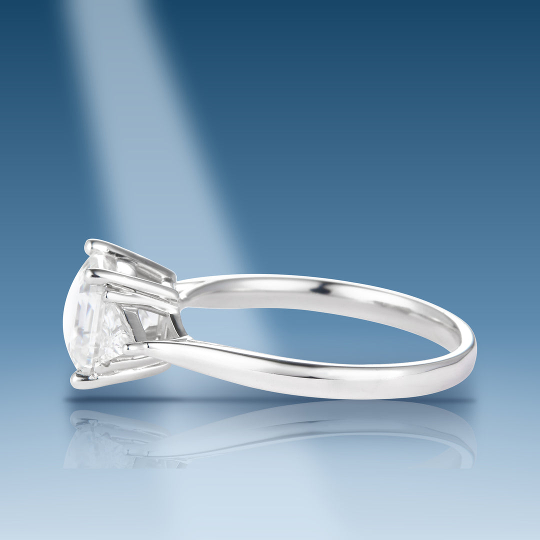 Sterling silver moissanite solitaire with emerald cut center stone ring