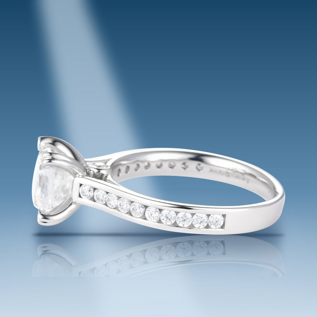 Sterling silver moissanite solitaire with emerald cut center stone ring