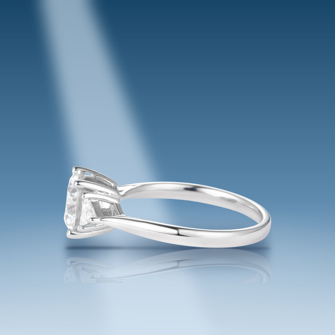 2.18 Ct. Moissanite Sterling Silver Solitaire Ring on blue