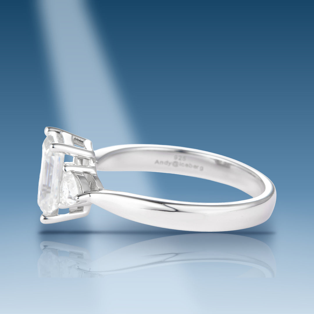Sterling silver moissanite 3 stone style with emerald cut center triangle side stones ring