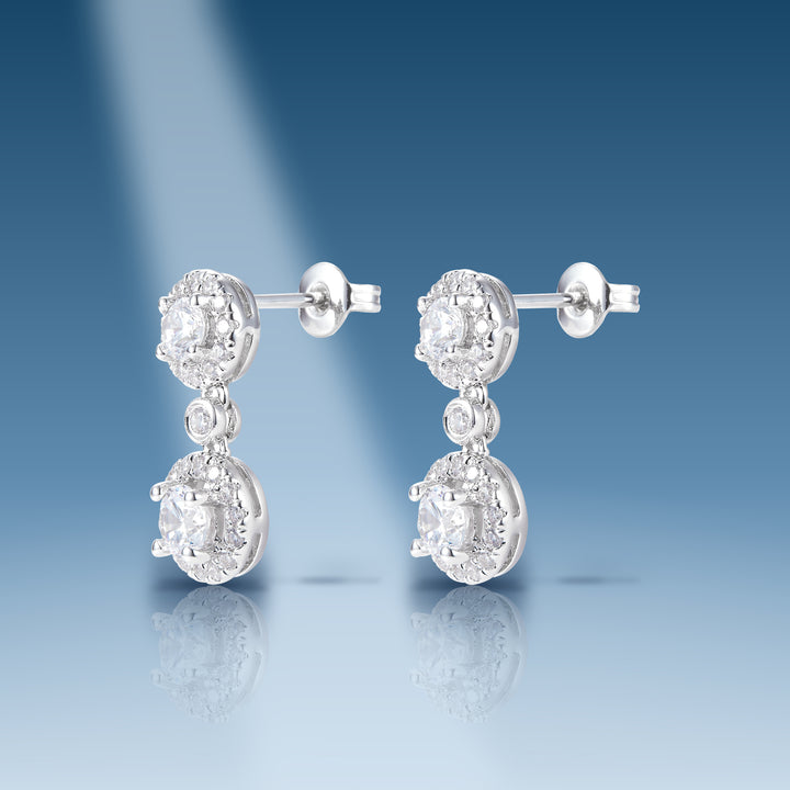 1.44 Ct. Moissanite Sterling Silver Dangle Earrings on blue