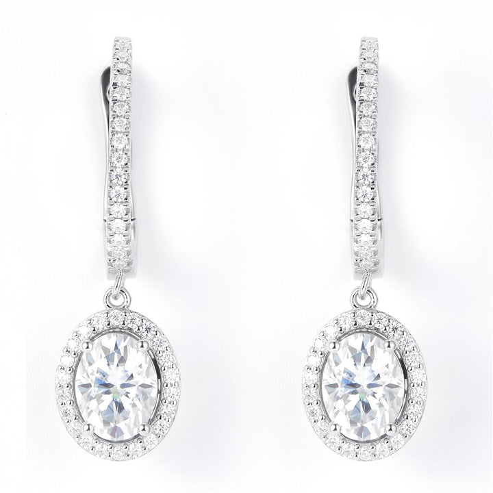 3.15 Ct. Moissanite Sterling Silver (White). Dangle with Oval Cut approx 1/2 Ct Center Stone Each. Hinged Snap Fastening Earrings. (Women).