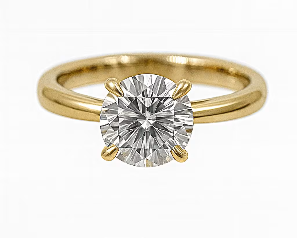 1.5 Ct. Diamond 14 Kt Gold (Yellow). Round Solitaire Ring. (Women). Size 7