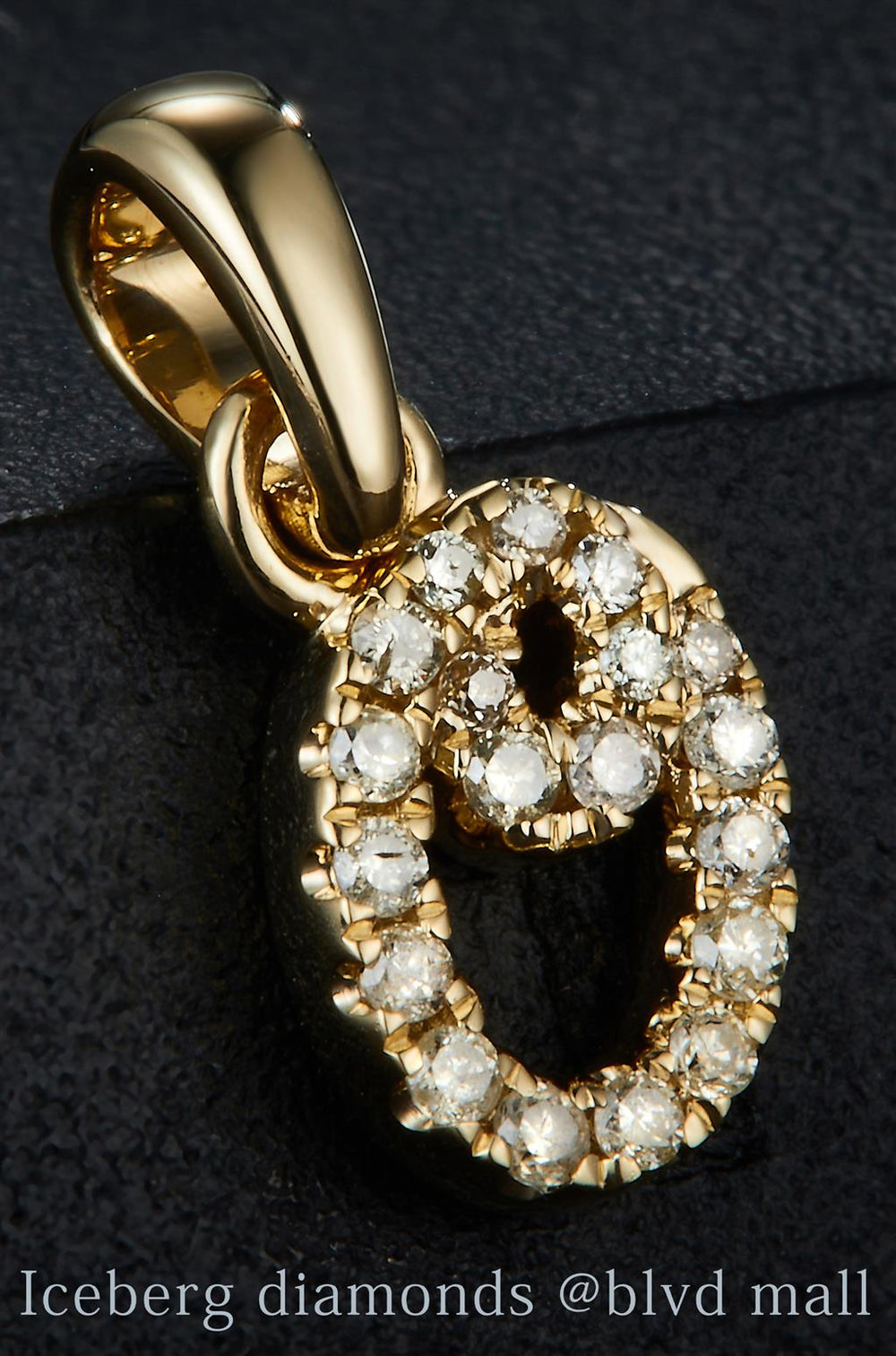 Yellow gold diamond initial letter O pendant