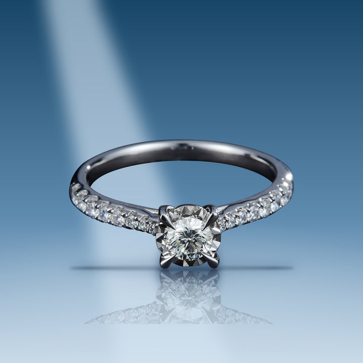 White gold diamond solitaire with center stone ring