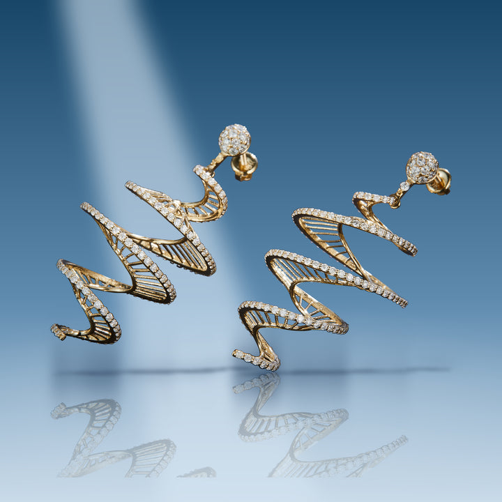 Yellow gold diamond graduated swirl earrings