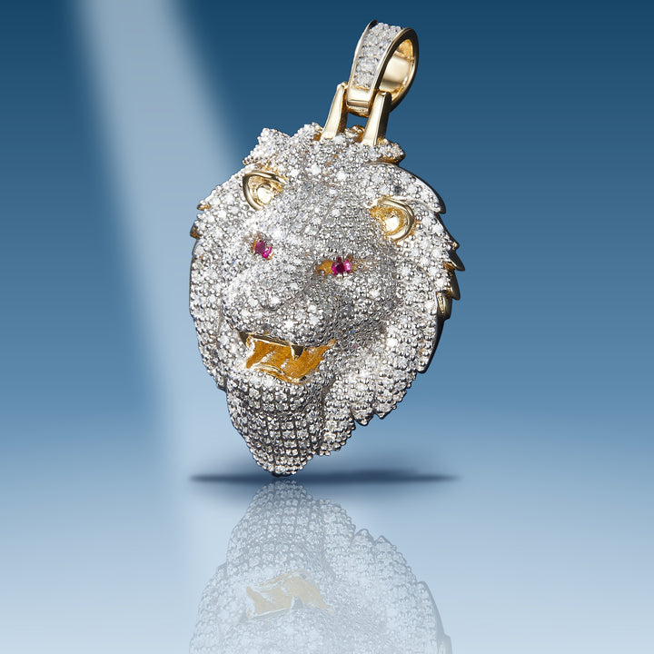 Yellow gold diamond lion head with ruby eyes pendant