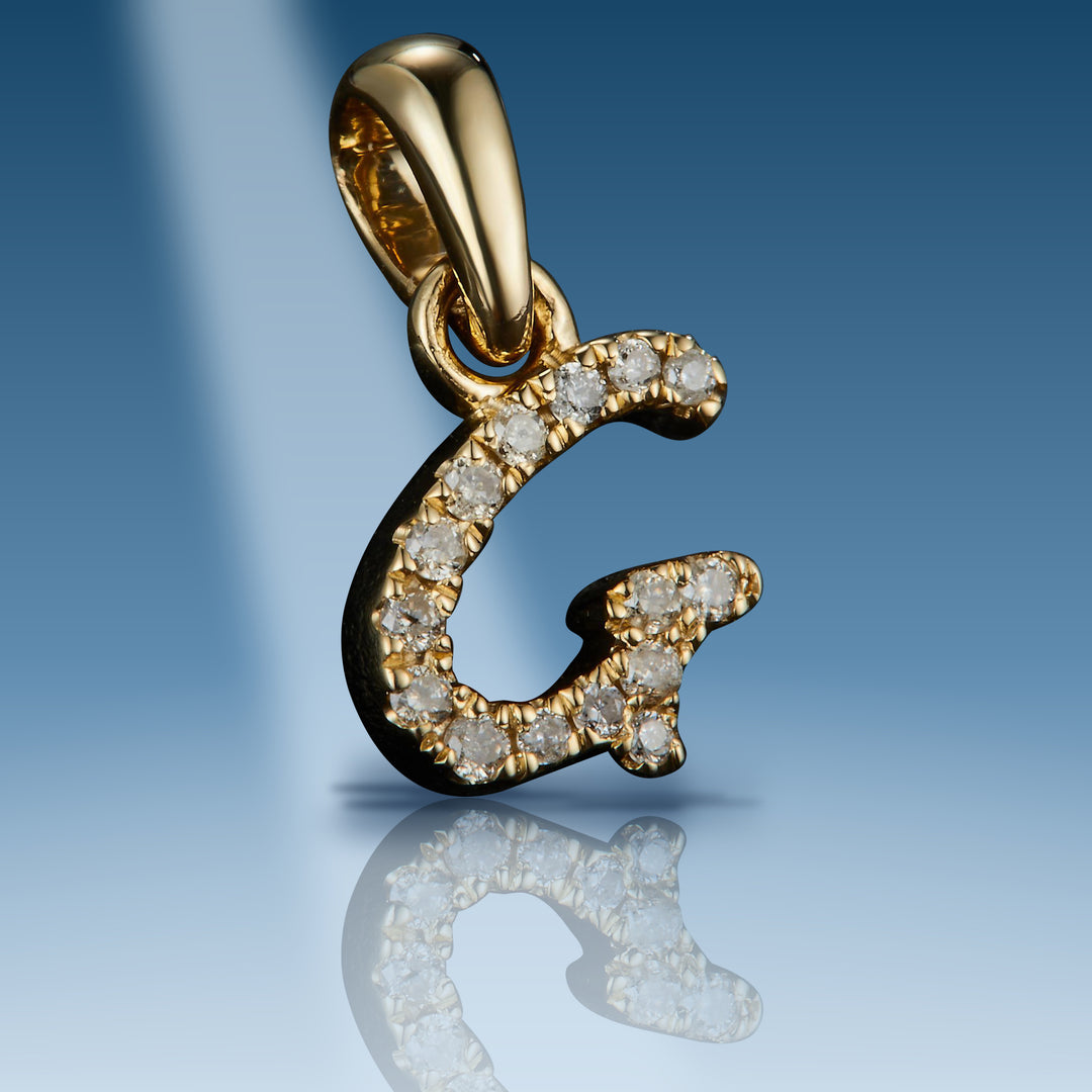 Yellow gold diamond initial letter G pendant