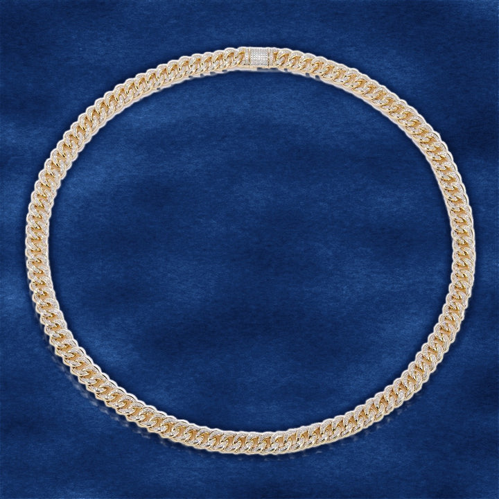 7.44 Ct. Diamond 10 Kt Gold (Yellow). Semi-Solid Cuban Link Chain on blue velvet