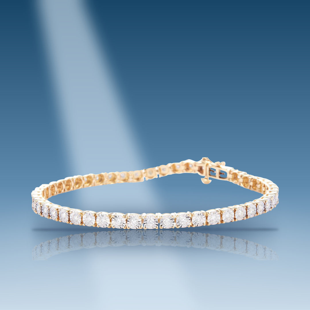 Yellow gold diamond tennis with illusion setting bracelet