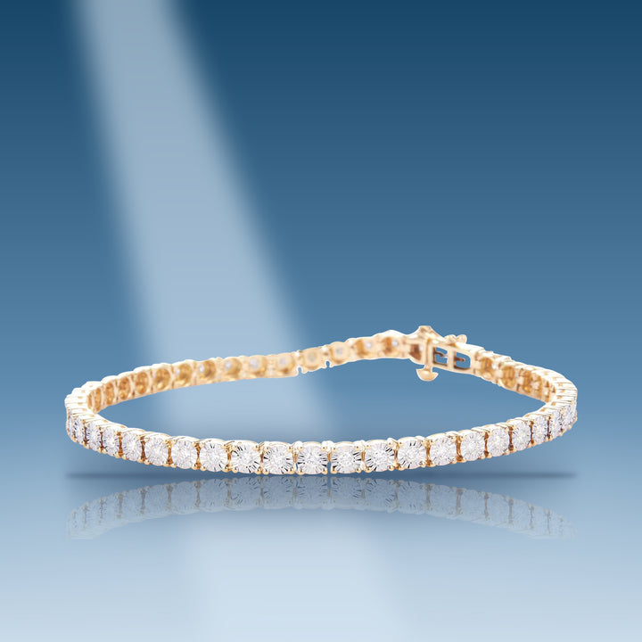 Yellow gold diamond tennis with illusion setting bracelet