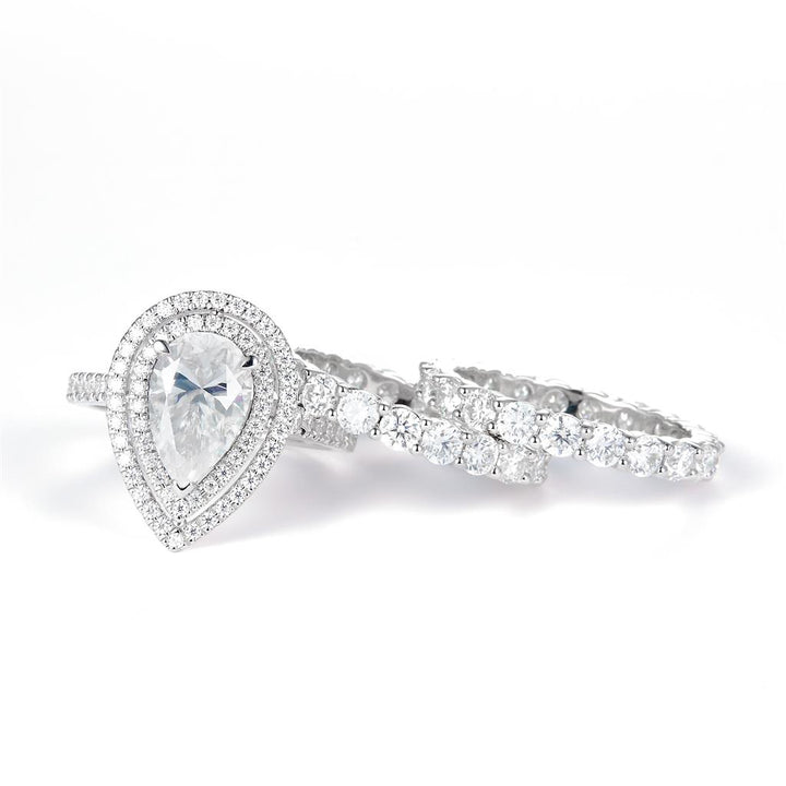 7.348 Ct. Moissanite Sterling Silver (White). Wedding Trio Set with Pear Shape Center Stone Ring. (Women). Size 7.5