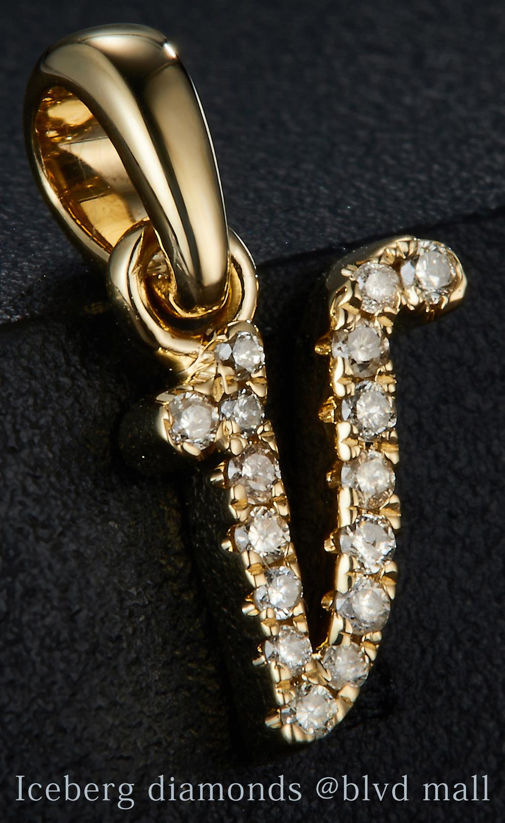 Yellow gold diamond initial letter V pendant