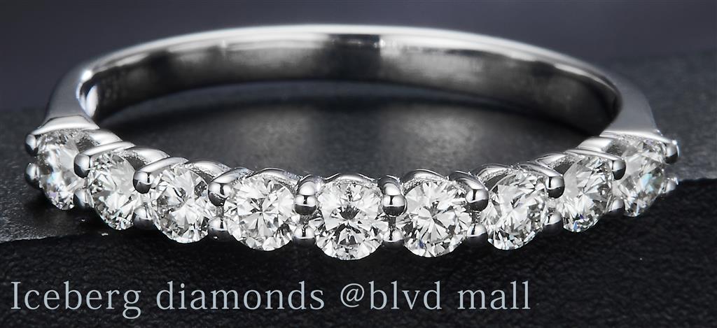 0.6 Ct. Diamond 14 Kt Gold (White). Wedding Band Wedding Band. (Women). Size 7