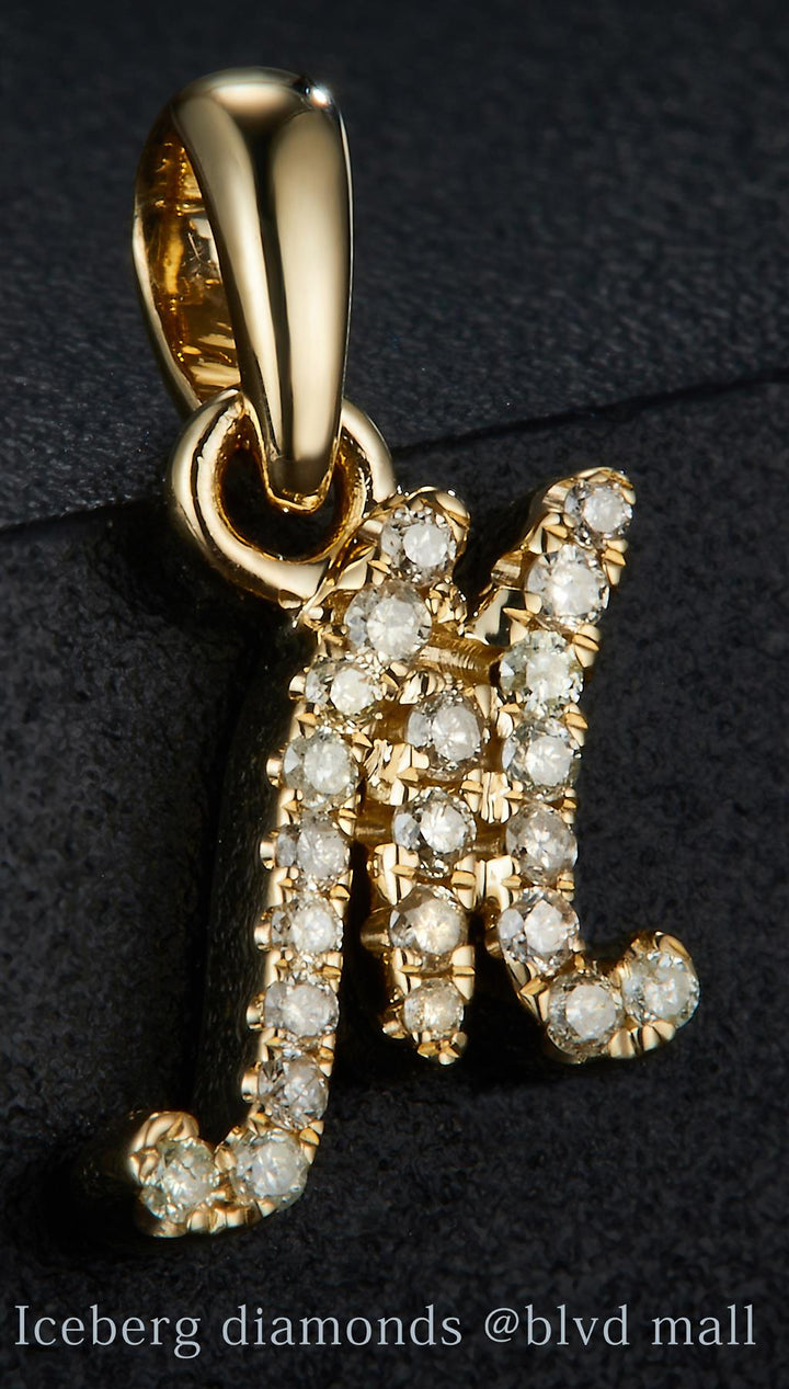 0.103 Ct. Diamond 10 Kt Gold (Yellow). Initial Letter/Alphabet "M" Pendant. (Women).