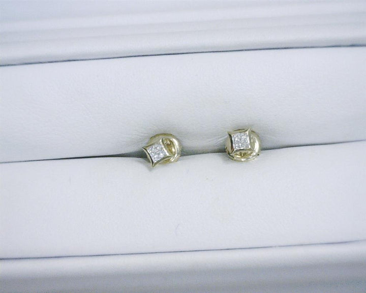 0.031 Ct. Diamond 10 Kt Gold (Yellow). Studs Earrings. (Unisex).