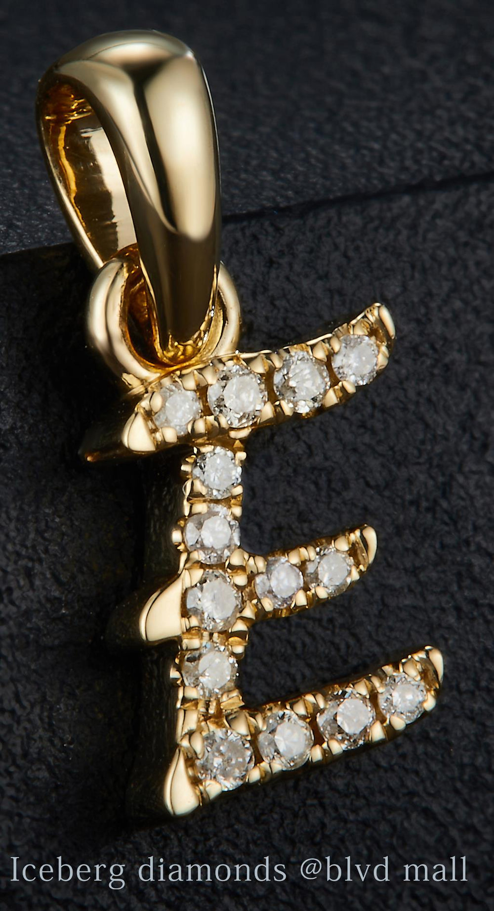 Yellow gold diamond initial letter E pendant