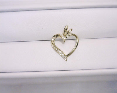 0.05 Ct. Diamond 10 Kt Gold (Yellow). Heart Pendant. (Women).