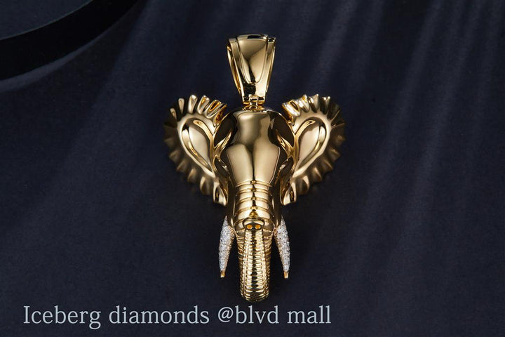 0.45 Carats. Diamond 10 Kt Gold (Yellow). CUSTOM ELEPHANT W/DIA. TUSK Pendant. (Unisex).