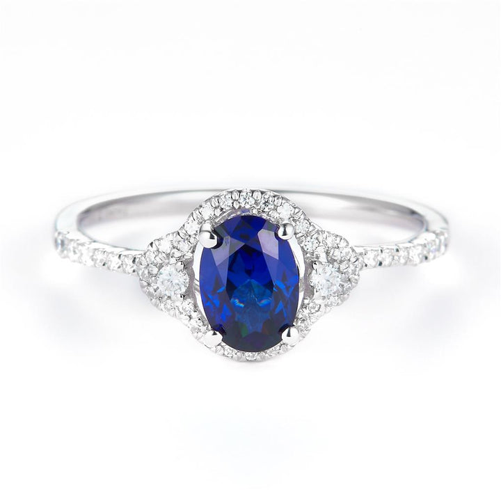 0.958 Ct. Moissanite Sterling Silver (White). Simulant Blue Sapphire Ring. (Women). Size 7.5
