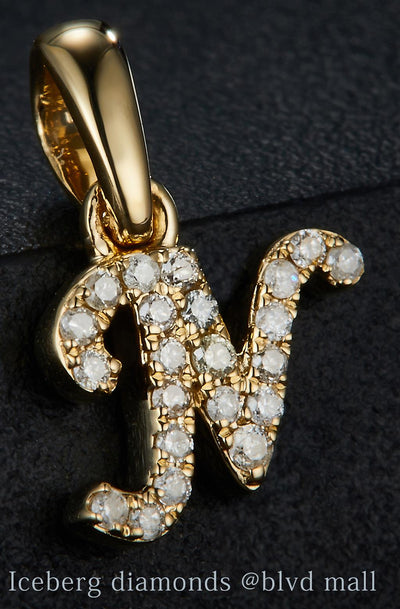 0.079 Ct. Diamond 10 Kt Gold (Yellow). Initial Letter/Alphabet "N" Pendant. (Women).