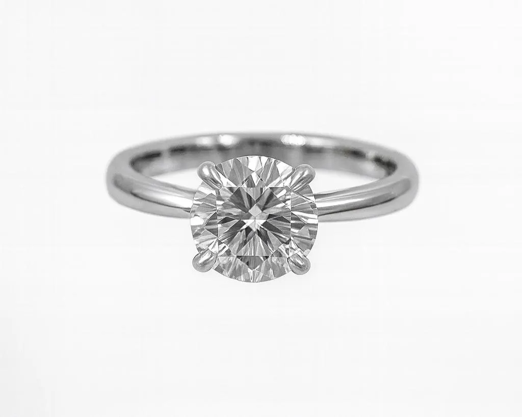 1.5 Ct. Diamond 14 Kt Gold (White). Round Solitaire Ring. (Women). Size 7