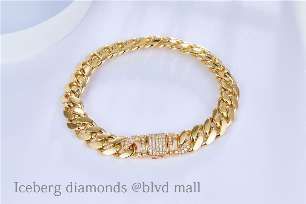 0.61 Ct. Diamond 14 Kt Gold (Yellow). Solid Cuban Link Bracelet. (Men). 9 in Long. 10 mm Wide