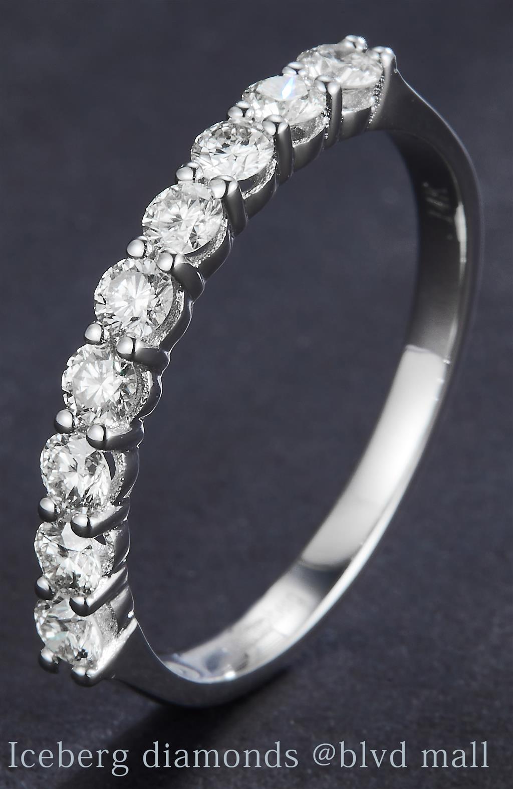 0.6 Ct. Diamond 14 Kt Gold (White). Wedding Band Wedding Band. (Women). Size 7