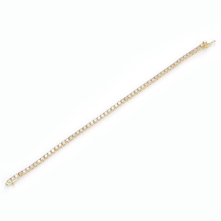 3.862 Ct. Diamond 10 Kt Gold (Yellow). TENNS Bracelet. (Unisex). 7.5 in Long. 2.5 mm Wide