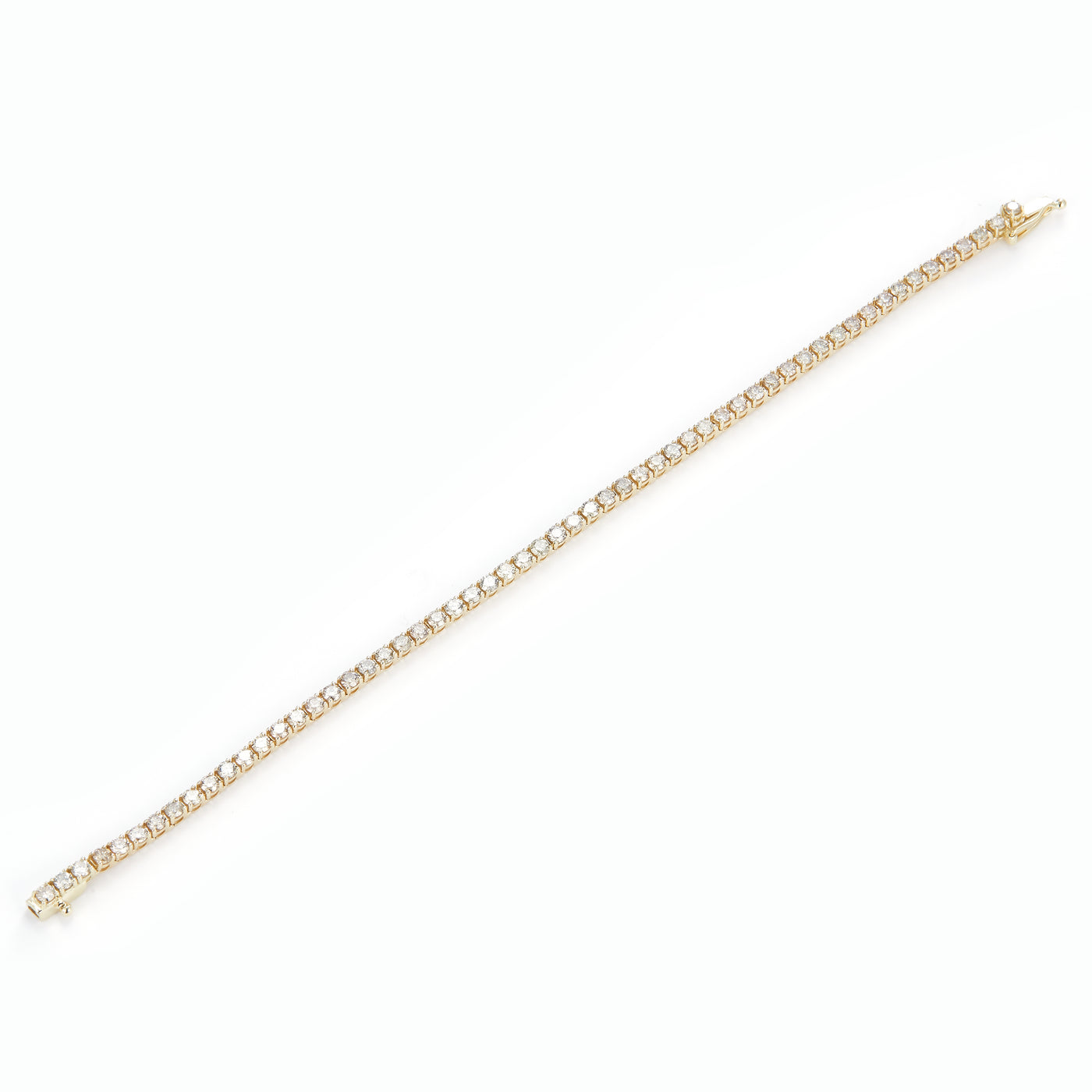 3.862 Ct. Diamond 10 Kt Gold (Yellow). TENNS Bracelet. (Unisex). 7.5 in Long. 2.5 mm Wide