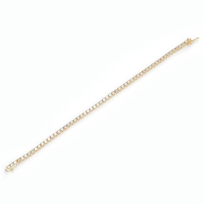 3.862 Ct. Diamond 10 Kt Gold (Yellow). TENNS Bracelet. (Unisex). 7.5 in Long. 2.5 mm Wide