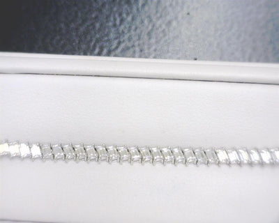5.805 Ct. Moissanite 14 Kt Gold (White). Baguettes Tennis Bracelet. (Women). 7.5 in Long. 4 mm Wide