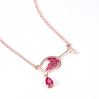 0.85 Ct. Moissanite Sterling Silver (Rosé). Champagne Glass Simulant Ruby & Sterling Silver Rose Gold Plated Necklace with Chain. Adjustable Length 15.5 to 17.5 in Pendant. (Women).
