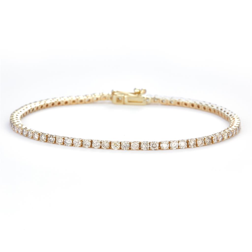 3.12 Ct. Diamond 10 Kt Gold (Yellow). TENNS Bracelet. (Unisex). 7 in Long. 2.2 mm Wide