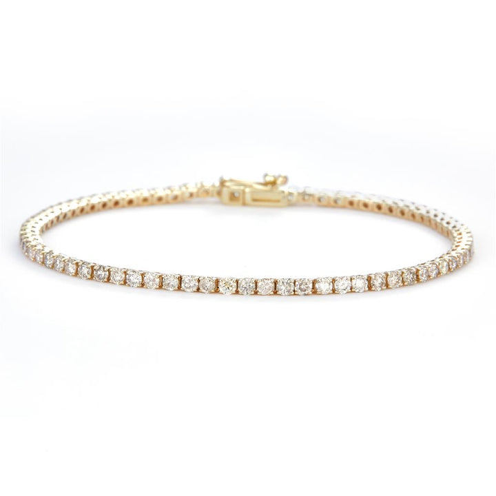 3.12 Ct. Diamond 10 Kt Gold (Yellow). TENNS Bracelet. (Unisex). 7 in Long. 2.2 mm Wide