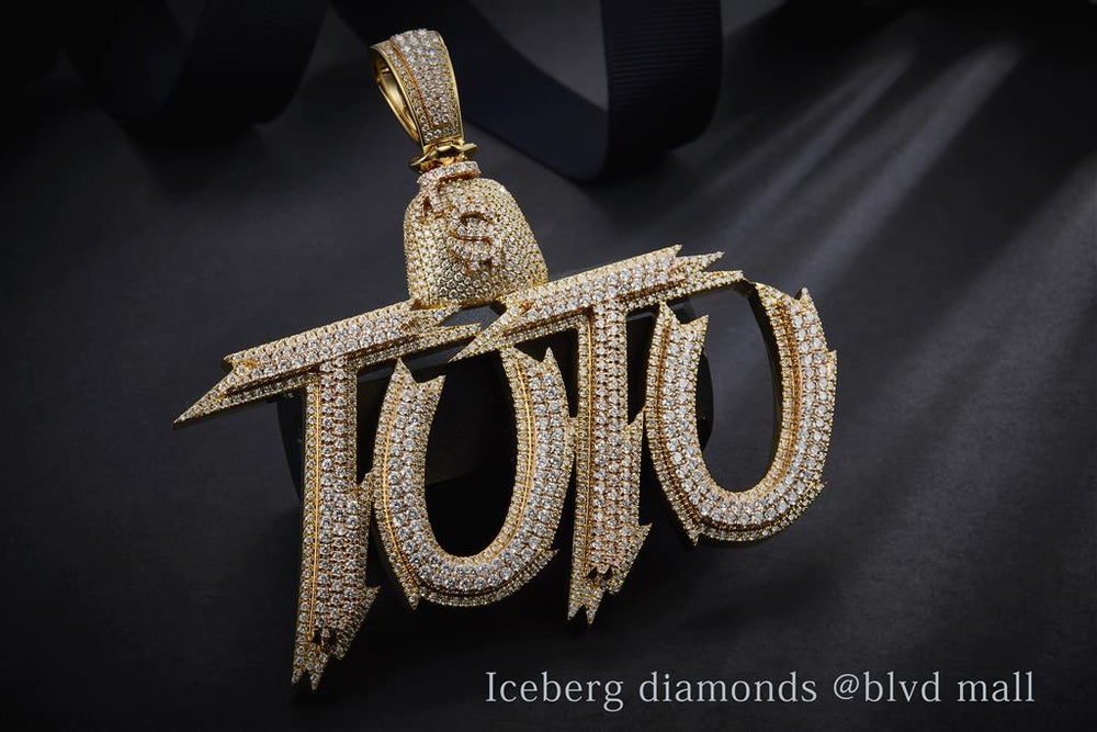 Yellow gold diamond tutu pendant