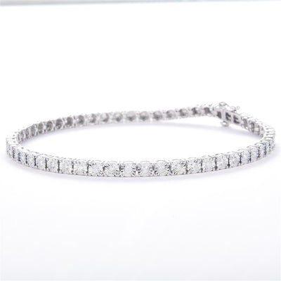 0.93 Ct. Diamond 10 Kt Gold (White). Tennis with Illusion Setting Bracelet. (Unisex). 7 in Long. 3.7 mm Wide