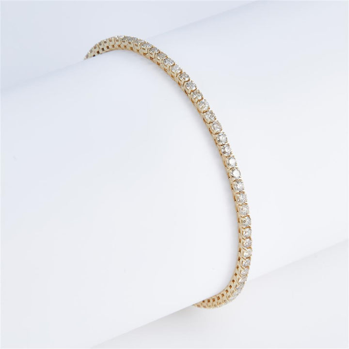 3.12 Ct. Diamond 10 Kt Gold (Yellow). TENNS Bracelet. (Unisex). 7 in Long. 2.2 mm Wide