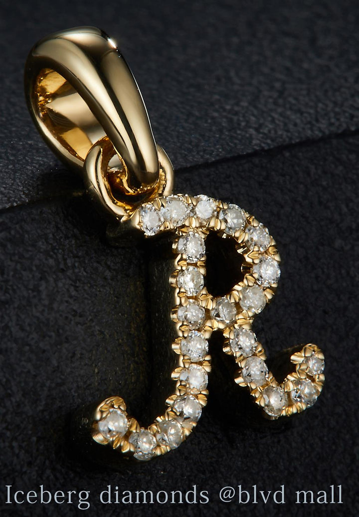 0.069 Ct. Diamond 10 Kt Gold (Yellow). Initial Letter/Alphabet "R" Pendant. (Women).