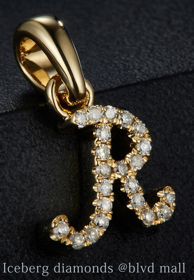 0.069 Ct. Diamond 10 Kt Gold (Yellow). Initial Letter/Alphabet "R" Pendant. (Women).