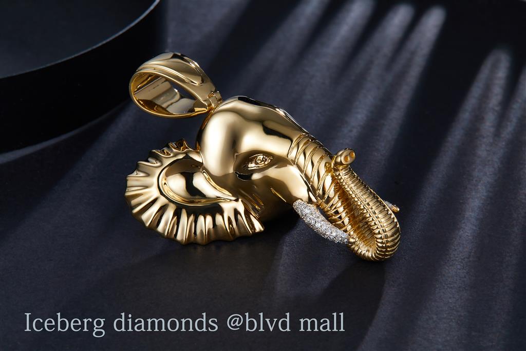 0.45 Carats. Diamond 10 Kt Gold (Yellow). CUSTOM ELEPHANT W/DIA. TUSK Pendant. (Unisex).