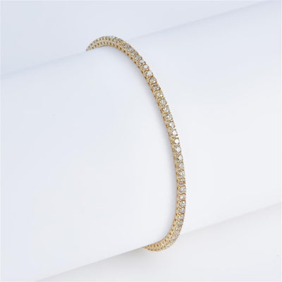 2.163 Ct. Diamond 10 Kt Gold (Yellow). TENNS Bracelet. (Unisex). 7 in Long. 1.9 mm Wide