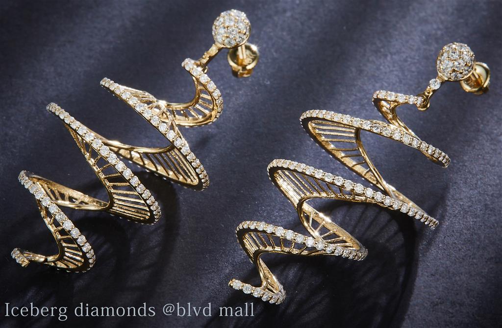 Yellow gold diamond graduated swirl earrings