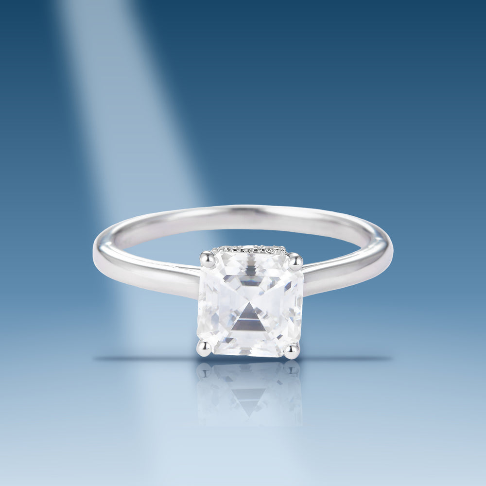 Sterling silver moissanite solitaire with emerald cut center stone ring